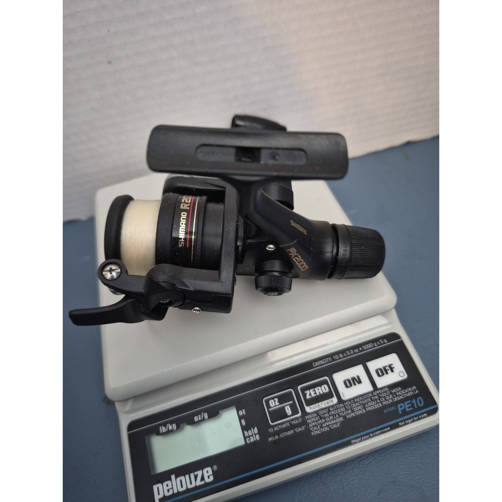 Shimano FX2000 REAR DRAG FISHING REEL SPINNING REEL